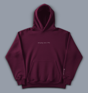 'annoying since 1974' image shows a men's hoodie in burgundy with white writing