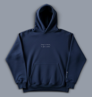'hang in there, it gets worse' image shows a men's hoodie in navy blue with white writing